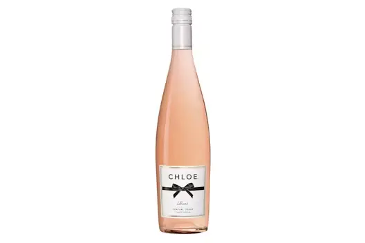 Bottle of Chloe Rosé wine with a soft pink hue, displayed upright on a clean white background.