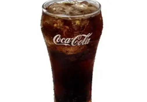 Glass of Coca-Cola filled with ice, showcasing the classic Coca-Cola logo on the front.